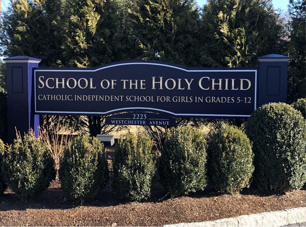 school of the holy child monument sign in their custom color